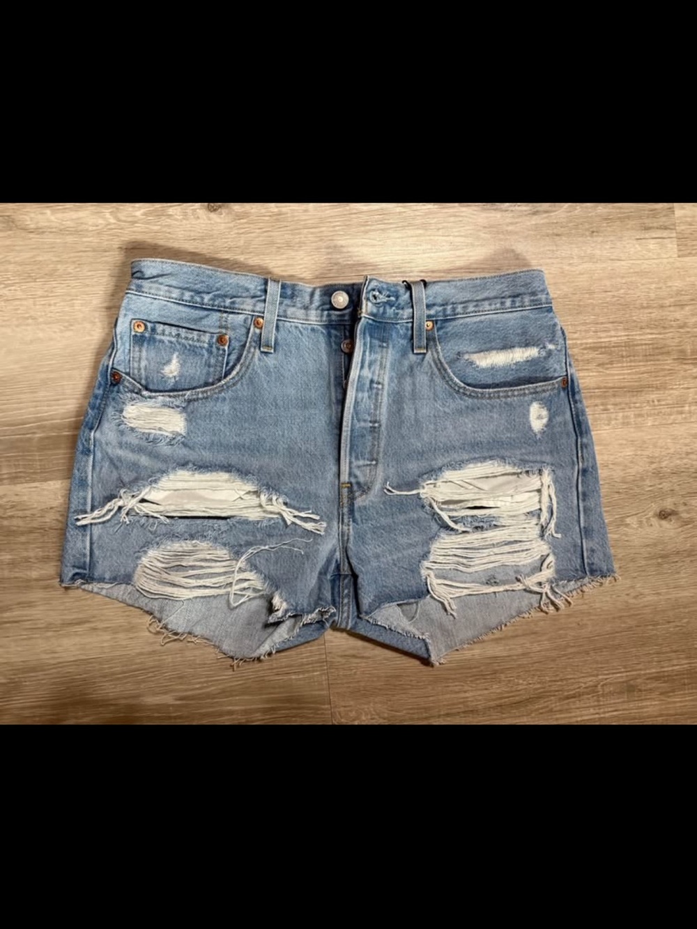 Levi's Light Blue Distressed Denim Shorts